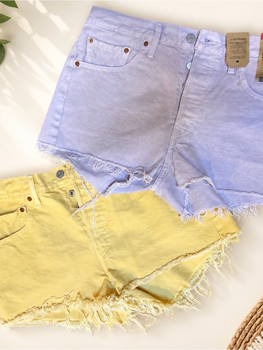 Levi's Lavender and Pale Yellow Distressed Denim Shorts
